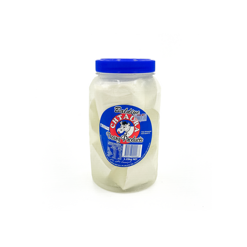 Chtaura Baldiye cheese in a fridge, 1.25kg block from Top Fruit Market, showing the cheese packaging and refrigerator shelf.