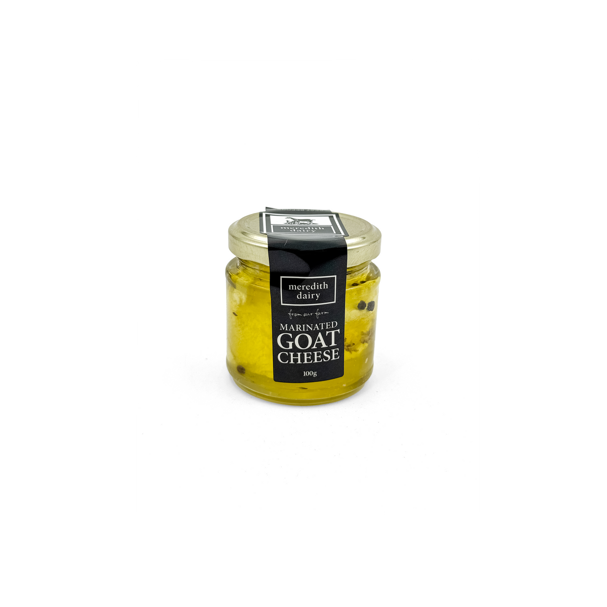 Marinated goat cheese from Meredith Dairy in a 100g fridge-friendly package, showcasing creamy cheese with herbs and spices.