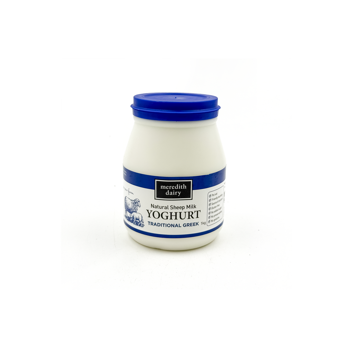 Natural sheep milk Greek yogurt in a 1kg container, stored in a fridge, showcasing creamy texture and traditional style.