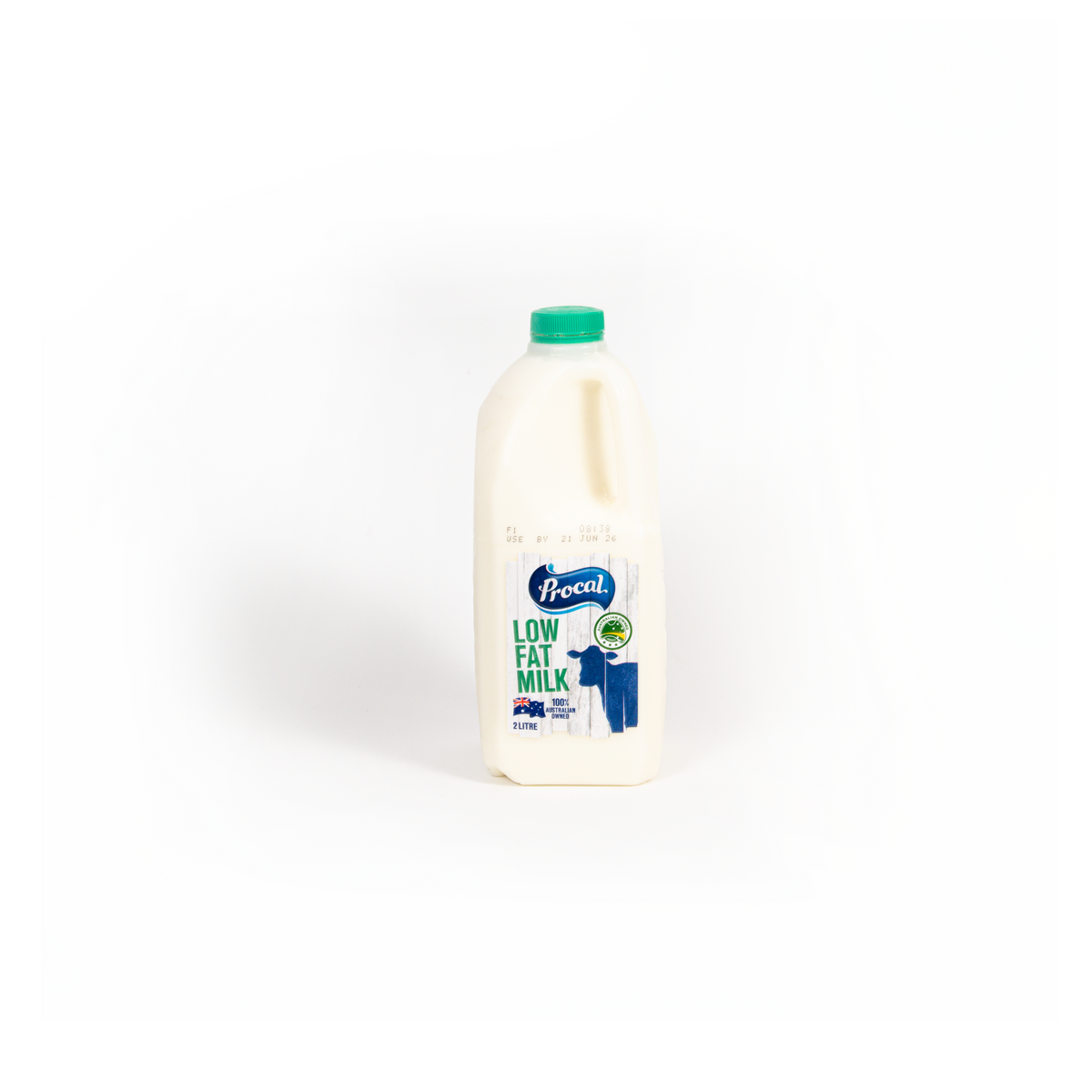 2L carton of Top Fruit Market Procal low fat milk in a fridge, showing the milk's packaging and label.